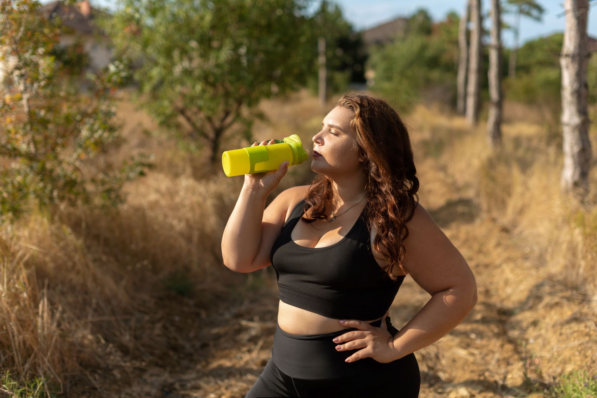 Overweight woman hydrating